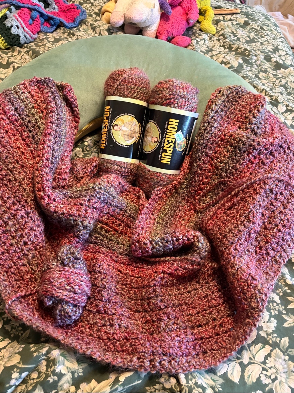 Homespun Variegated Pink Lavender Crochet Throw with Yarn bundle in Great Plains